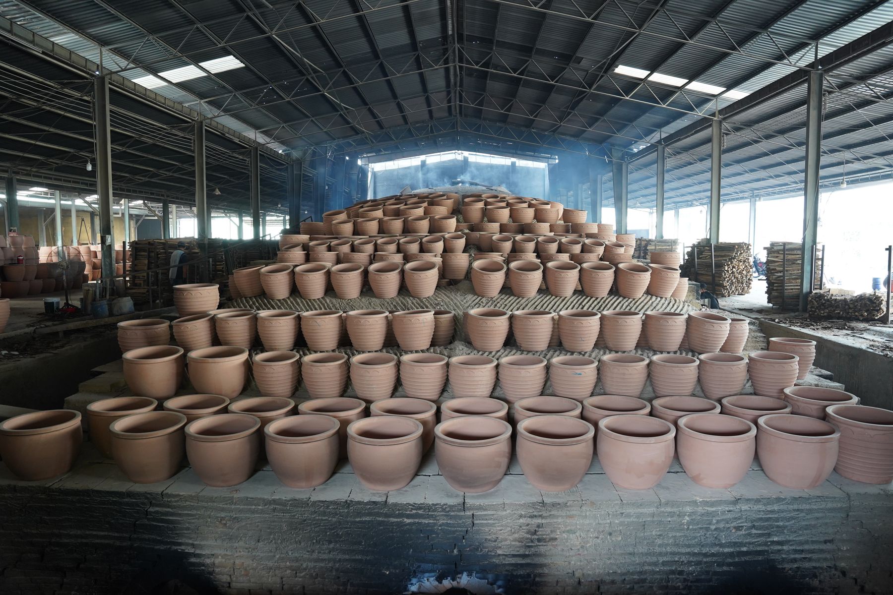 Pots drying in the sun before firing, TNL & Son factory, Binh Duong, Vietnam