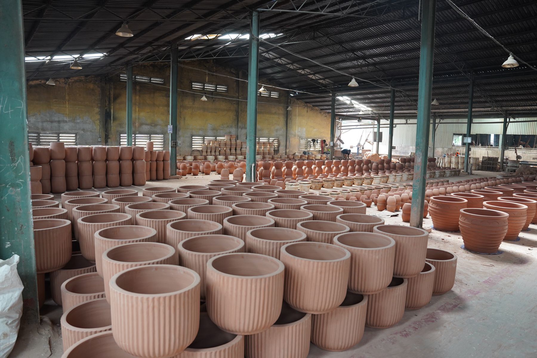 Rows of unfired pots ready for the kiln, TNL & Son factory, Binh Duong, Vietnam