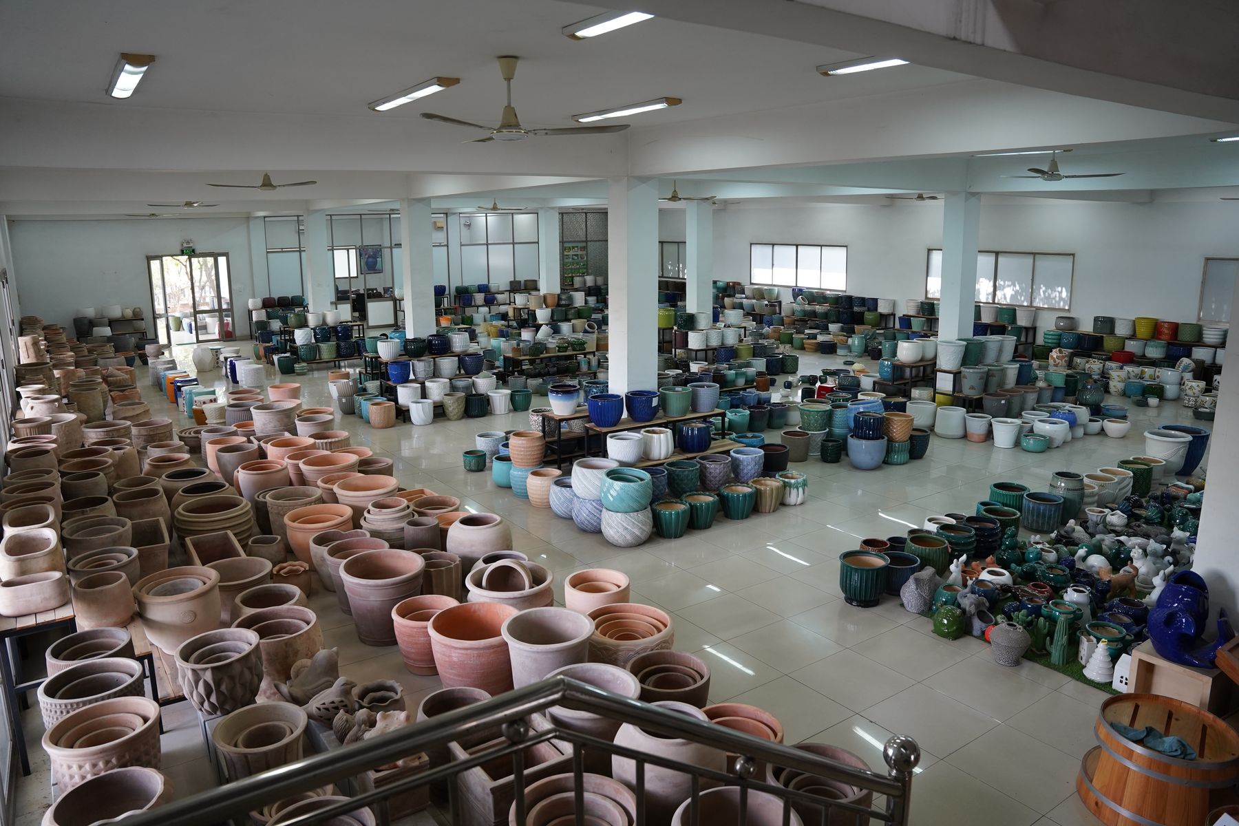 Rows of glazed pots inside the showroom, TNL & Son factory, Binh Duong, Vietnam