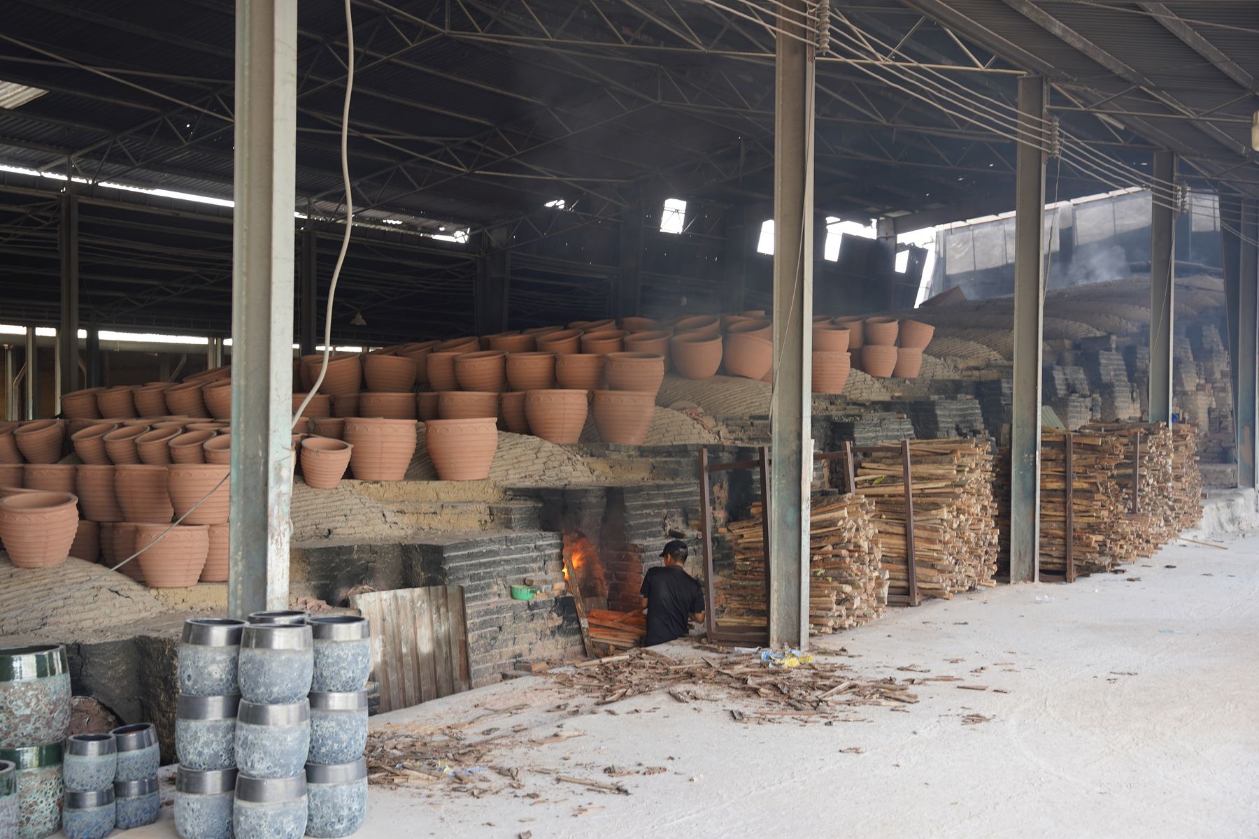 The dragon kiln's full length, wood stacked ready for firing, TNL & Son factory, Binh Duong, Vietnam