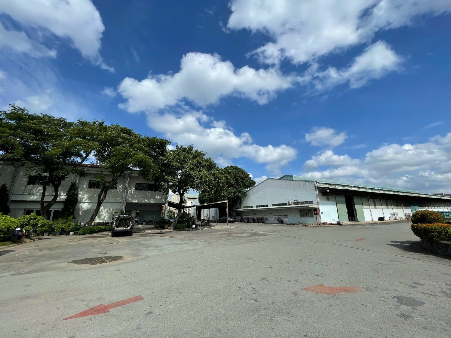 Loading area seen across the yard, TNL & Son factory, Binh Duong, Vietnam
